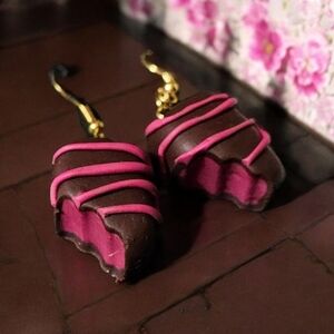 NWT, Earrings Handmade, hypoallergenic, whimsical bite from a chocolate